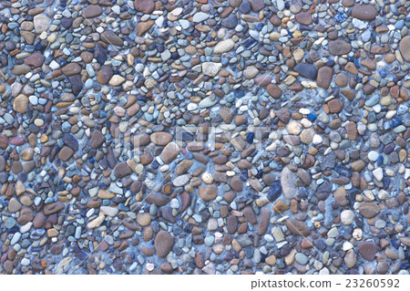 Sea pebble background 23260592