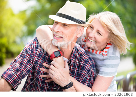 Aged couple enjoying each other Aged couple enjoying each other 23261908
