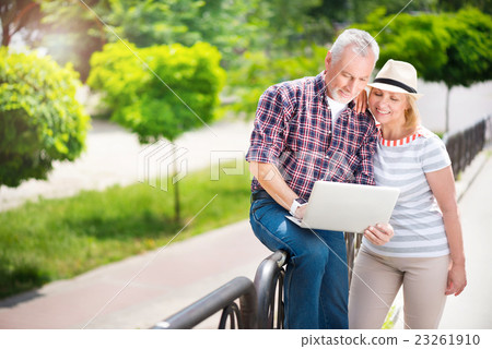 Aged couple enjoying each other Aged couple enjoying each other 23261910