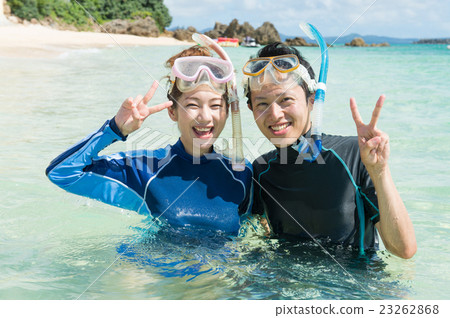 A couple taking snorkeling 23262868
