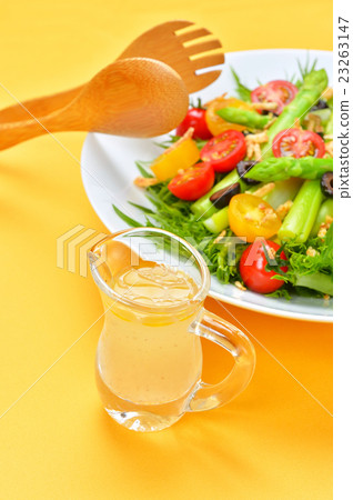Healthy vegetable green salad. Ingredients are leaf lettuce, mini tomatoes, asparagus, olives (salted). Healthy vegetable green salad. Ingredients are leaf lettuce, mini tomatoes, asparagus, olives (salted). 23263147