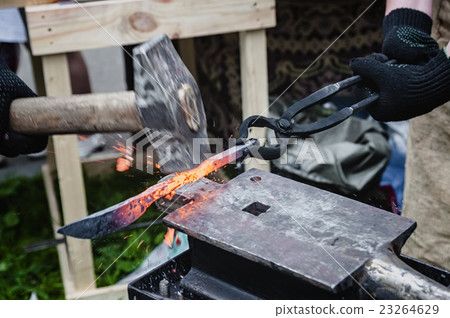 Forging of metal products on the anvil 23264629