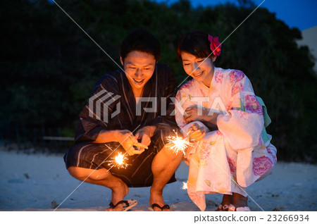 A couple who makes fireworks in a yukata 23266934