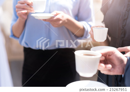 Pleasant colleagues drinking coffee 23267951