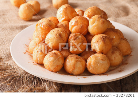 Turkish lokma donuts with honey and cinnamon 23278201