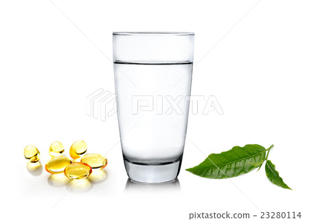 Glass of water wiith green tea leaf and fish oil Glass of water wiith green tea leaf and fish oil 23280114