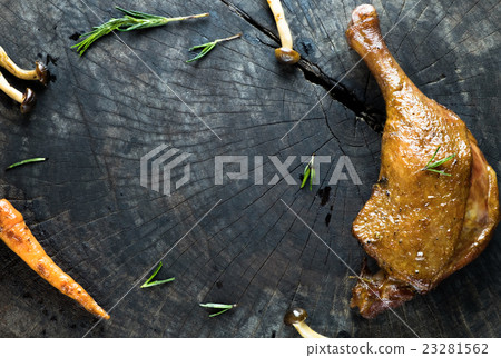 Grilled duck steak on wood, top view 23281562