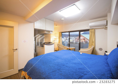 interior of bedroom with blue bed linen interior of bedroom with blue bed linen 23283275