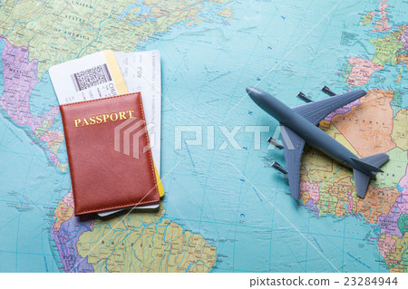 Passport with tickets on map. 23284944