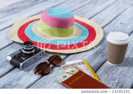 Beach hat and passport. 23285291