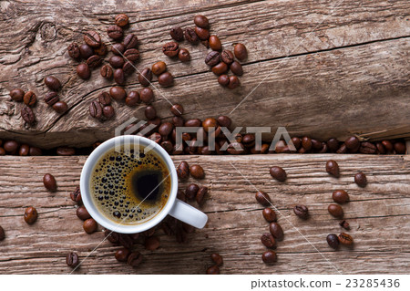 Coffee cup on wooden background. Coffee cup on wooden background. 23285436