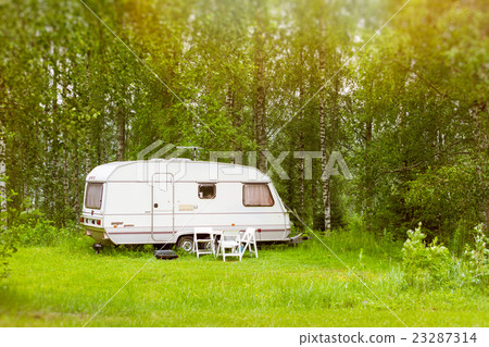 Camping van on a green meadow. Campsite, Lappeenra 23287314