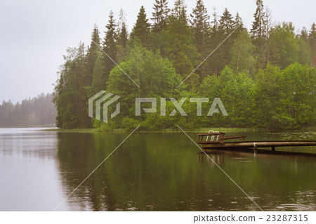 Wooden boat pier on lake. Campsite, Lappeenranta 23287315
