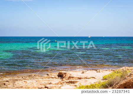 Sailboats floating in sea on horizon, Torrevieja 23287341