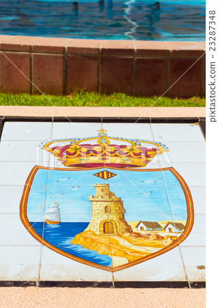 State emblem of city depicted on white tiled floor State emblem of city depicted on white tiled floor 23287348