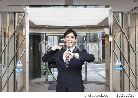 A businessman going to work 23292725