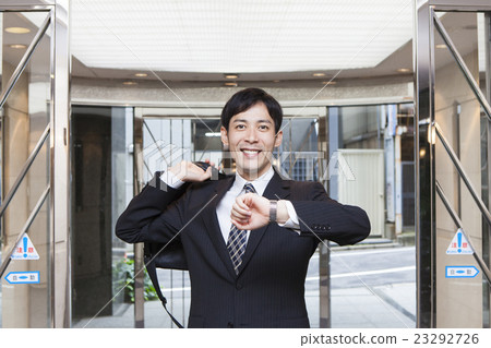 A businessman going to work A businessman going to work 23292726