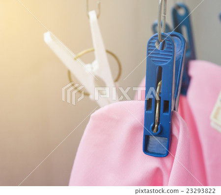 Hanging dry clothes 23293822