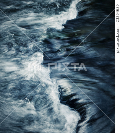 background detail on the rapids of the river 23294689
