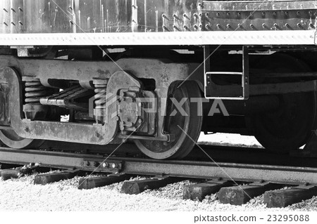 Beautiul black and white image of the train wheels Beautiul black and white image of the train wheels 23295088