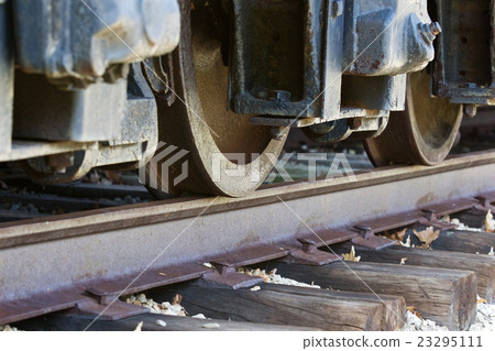 Beautiful picture with old train wheels and road Beautiful picture with old train wheels and road 23295111