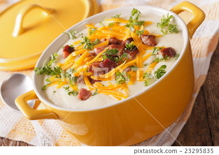 Tasty thick potato soup with bacon and cheddar 23295835
