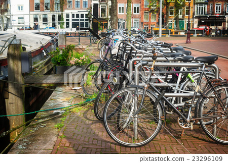 bicycles next to canal of Amsterdam  23296109
