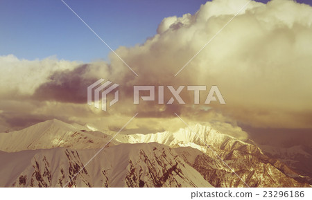 Snow mountains and blue sky with clouds Snow mountains and blue sky with clouds 23296186