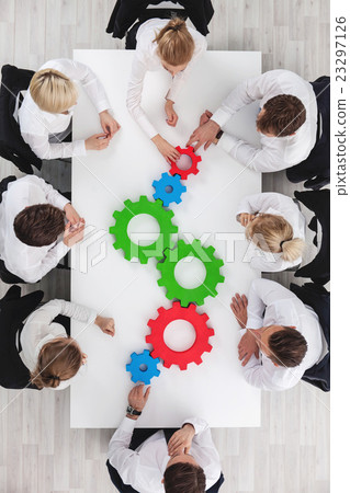Teamwork with cogs of business 23297126
