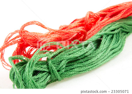 two balls of cotton blue and yellow 23305071