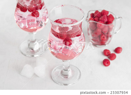 Summer cold drink with raspberry and ice Summer cold drink with raspberry and ice 23307934
