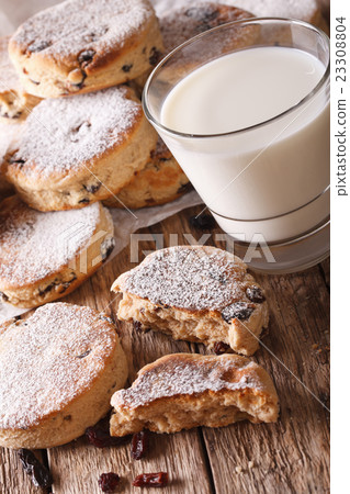 Freshly baked Welsh cakes with raisins and milk 23308804