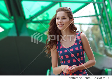 Shopping womanwith bag  in city 23309325
