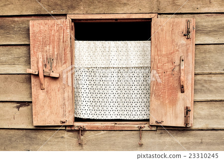 Wooden window at ancient building Wooden window at ancient building 23310245