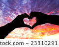 Silhouette hand in heart shape and beautiful sky 23310291