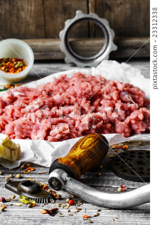 meat ground in meat grinder meat ground in meat grinder 23312338
