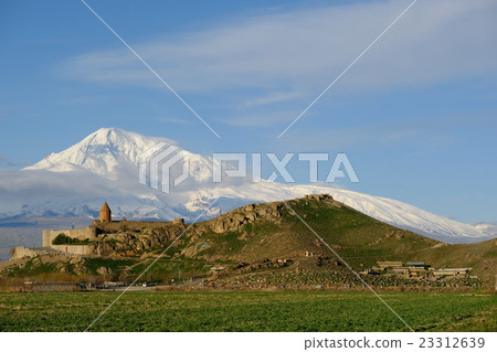 Ancient monastery in front of mountain Ancient monastery in front of mountain 23312639