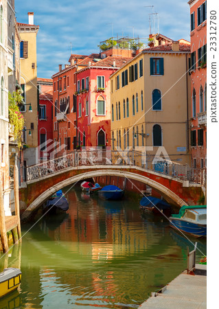 Colorful lateral canal and bridge in Venice, Italy Colorful lateral canal and bridge in Venice, Italy 23312780