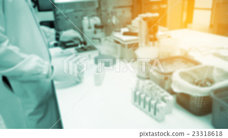 Out of focus works in chemistry laboratory. 23318618