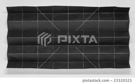 Folded black paper in 64 parts Folded black paper in 64 parts 23320323