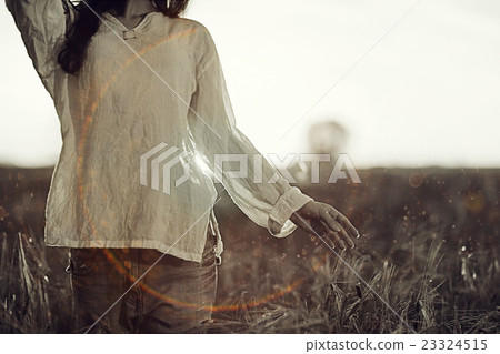 black and white photo of the girl in a field freedom 23324515
