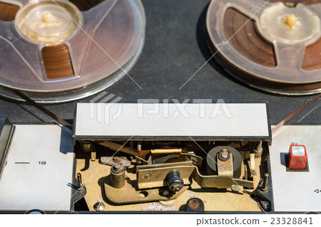 recording tape is inserted in mechanical guides recording tape is inserted in mechanical guides 23328841