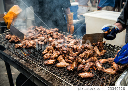 chicken wings and legs on barbecue grill chicken wings and legs on barbecue grill 23340628