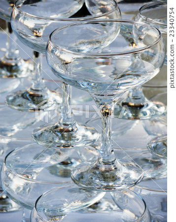 Stack of empty wine glasses Stack of empty wine glasses 23340754