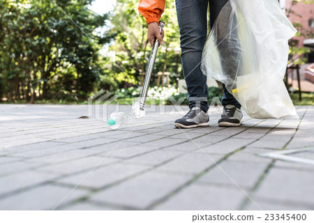 Picking up rubbish 23345400