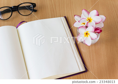 frangipani flowers in glass with blank note book frangipani flowers in glass with blank note book 23348013