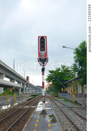 Railroad with traffic light after raining 23349394