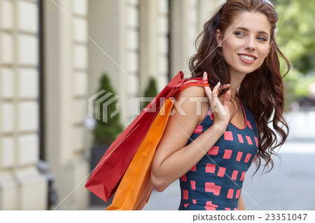 beautiful summer woman goes shopping in the city beautiful summer woman goes shopping in the city 23351047