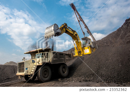Excavator at work in open pit Excavator at work in open pit 23352362