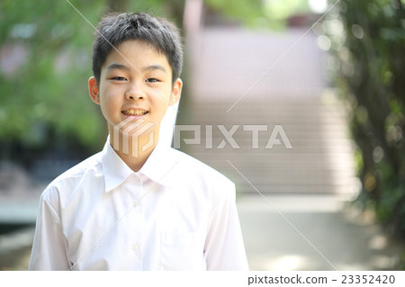 Male junior high school student smiling Male junior high school student smiling 23352420